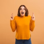 excited-emotional-young-woman_171337-36050